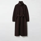 Long tweed coat women in deep brown featuring a minimalist belted shape and structured wool texture ideal for polished winter outfits