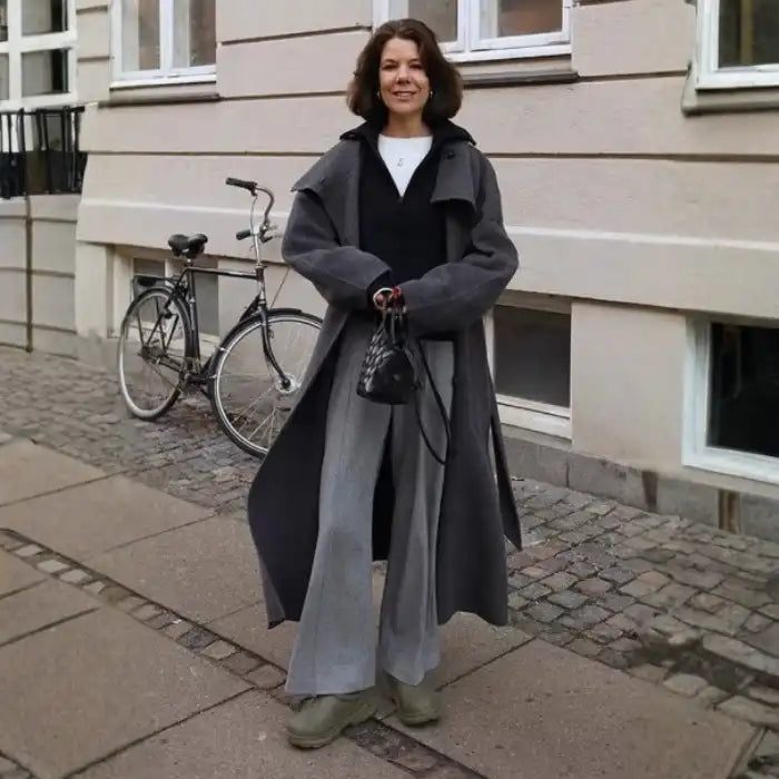Long tweed coat women styled in grey with layered winter pieces, offering a refined oversized silhouette and soft wool feel for comfort