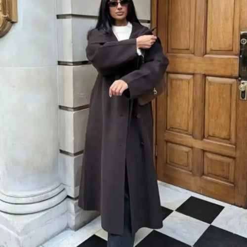 Long tweed coat women in dark brown, styled oversized with sleek winter layers for a minimalist premium look perfect for cold seasons