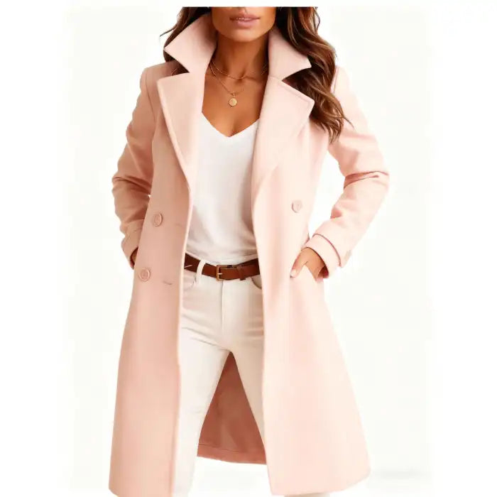 Long wool coat in blush pink with soft feminine tones and structured lapel collar for chic layering.