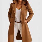 Long wool coat in camel brown with tailored fit and lapel collar, ideal for fall layering.