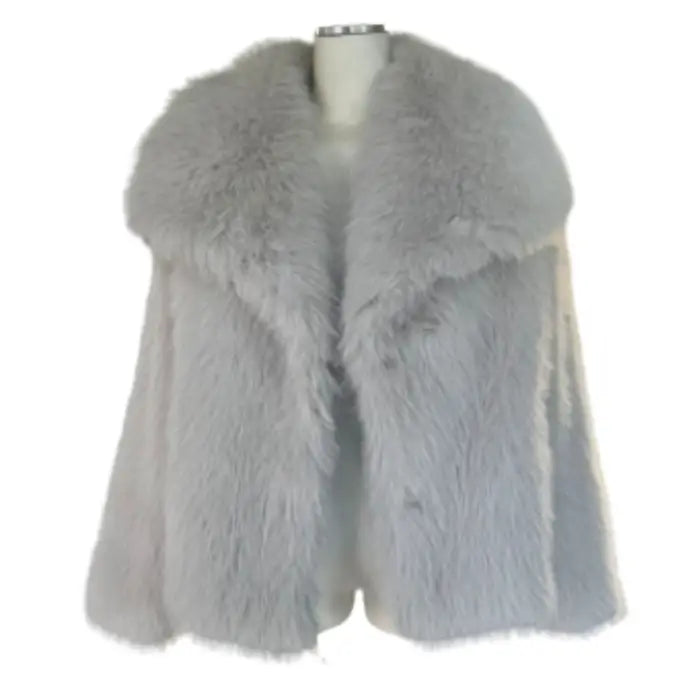 Luxury faux fur coat in grey showcased on mannequin with wide collar and fluffy fibers, offering classic premium warmth for winter outfits
