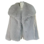 Luxury faux fur coat in grey showcased on mannequin with wide collar and fluffy fibers, offering classic premium warmth for winter outfits