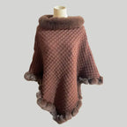 Luxury Fur-Trimmed Knit Poncho in warm brown shade featuring plush fur accents and textured knit fabric suited for winter fashion