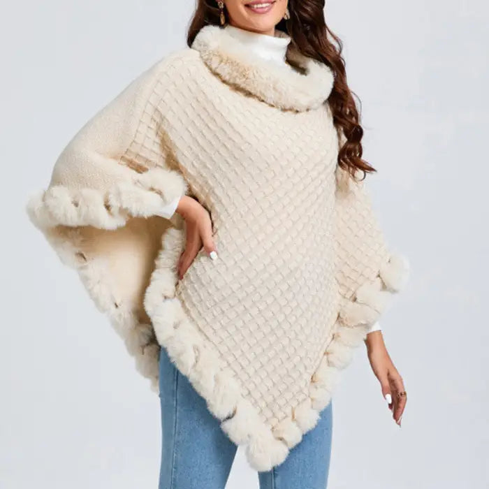 Luxury Fur-Trimmed Knit Poncho in cream with textured knit and soft fur trim shown in detailed side view for winter style shoppers