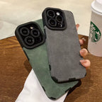 Luxury suede phone cover duo in grey and green held together, showcasing premium textured suede cases with durable protective build.