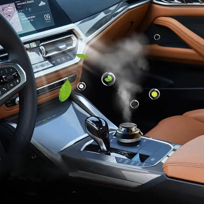 Modern car interior featuring dashboard-mounted aromatherapy diffuser with natural leaf essence particles