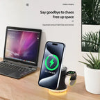 magnetic 4 in 1 wireless charging station on desk organizing phone watch and earbuds for clean clutter free workspace charging
