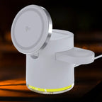 magnetic 4 in 1 wireless charging station in white illuminated base showing clean design for organized nighttime charging