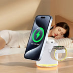 magnetic 4 in 1 wireless charging station in white charging phone watch and earbuds on nightstand for quiet nighttime convenience