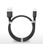 magnetic self coiling usb c charging cable tightly coiled on desk with magnetic segments keeping shape for efficient charging