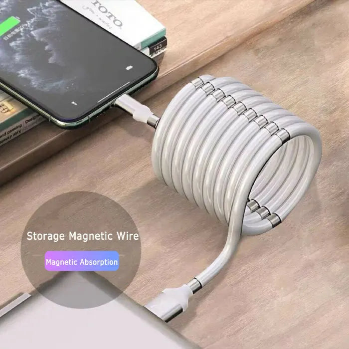 magnetic self coiling usb c charging cable neatly attached to wall charger showing compact coiled design for clutter free charging