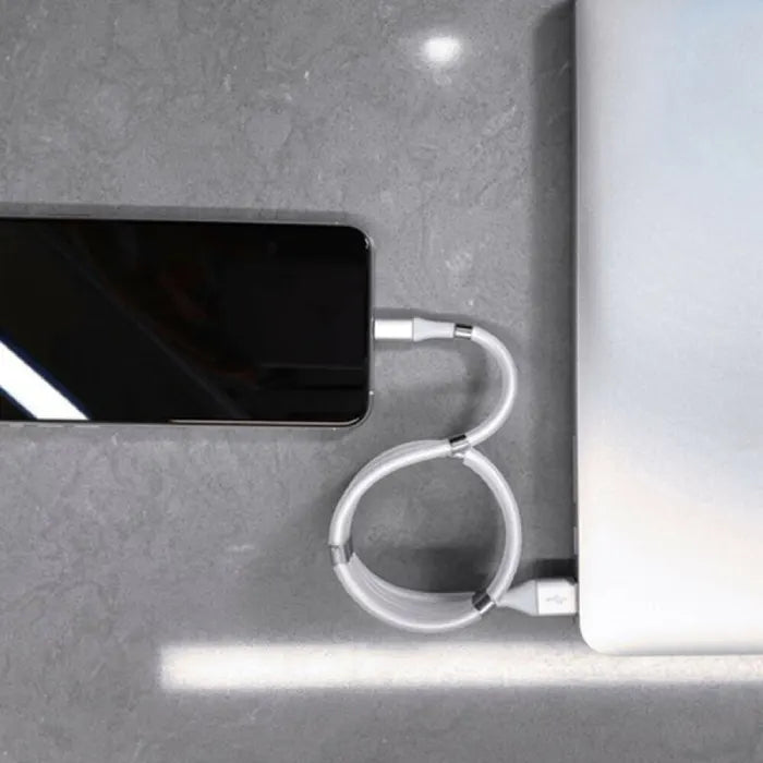 magnetic self coiling usb c charging cable in minimalist white design featuring smooth magnetic segments for tangle free charging