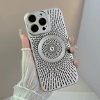 Magnetic wireless phone case in gray with radial vented design held by hand in neutral lighting.