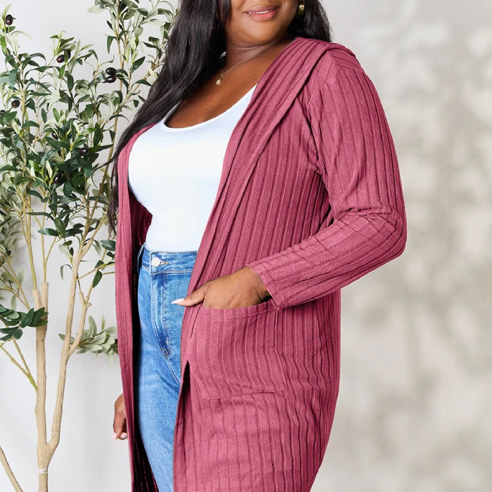 Trendy mauve pink ribbed cardigan paired with classic blue jeans and white tank top for contemporary plus size fashion