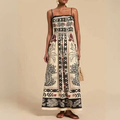 Maxi dress with black and beige boho prints, square neckline and thin straps styled with tassel bag.