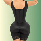 Black medical grade waist trainer shown from the back with full compression and lace leg trim.