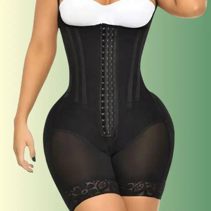 Black medical grade waist trainer shown from the back with full compression and lace leg trim.