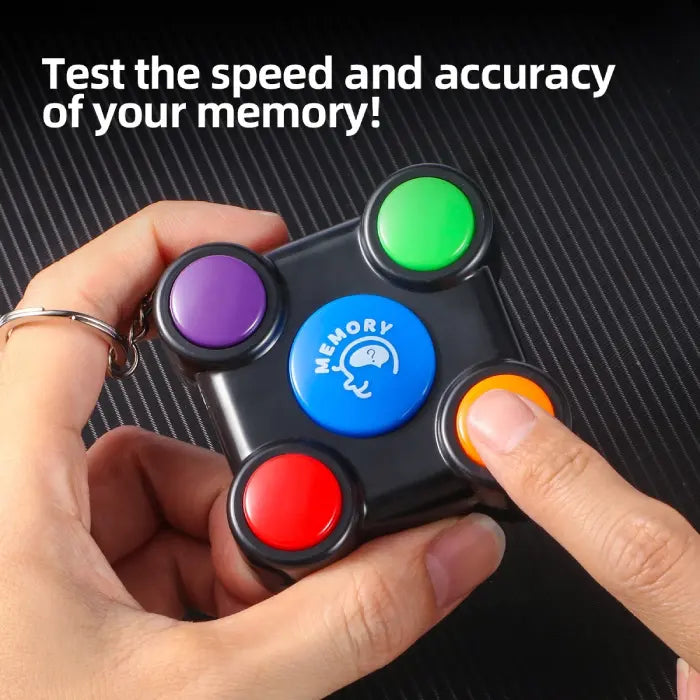 Hand pressing button on memory game to test speed and memory accuracy during play.