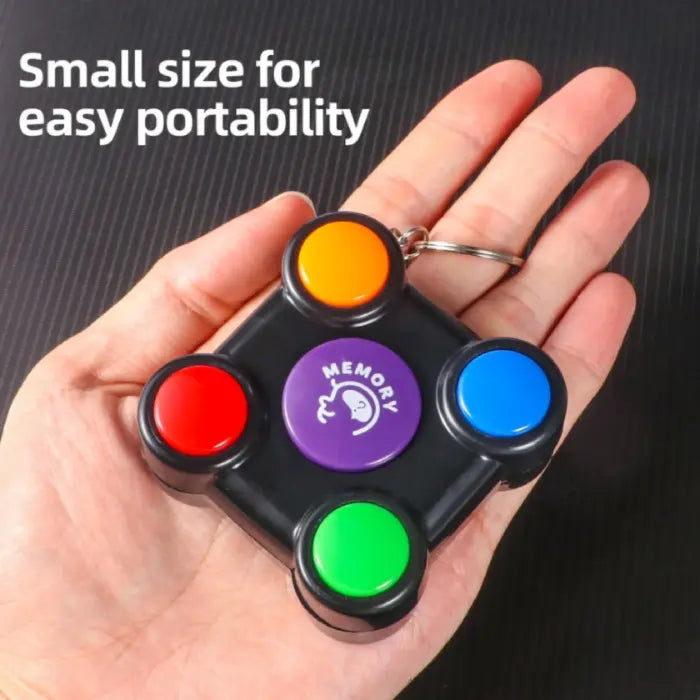 Memory game keychain size shown in hand, compact and portable design for on-the-go play.