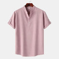 Men's blouse maroon plain fabric with short sleeves and rolled cuffs front view on hanger