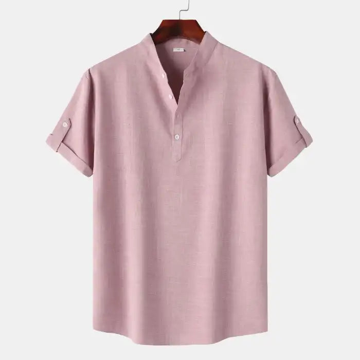 Men's blouse maroon plain fabric with short sleeves and rolled cuffs front view on hanger
