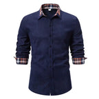 Men's casual plaid shirt in navy blue with orange and white plaid collar and cuffs, front view with sleeves rolled