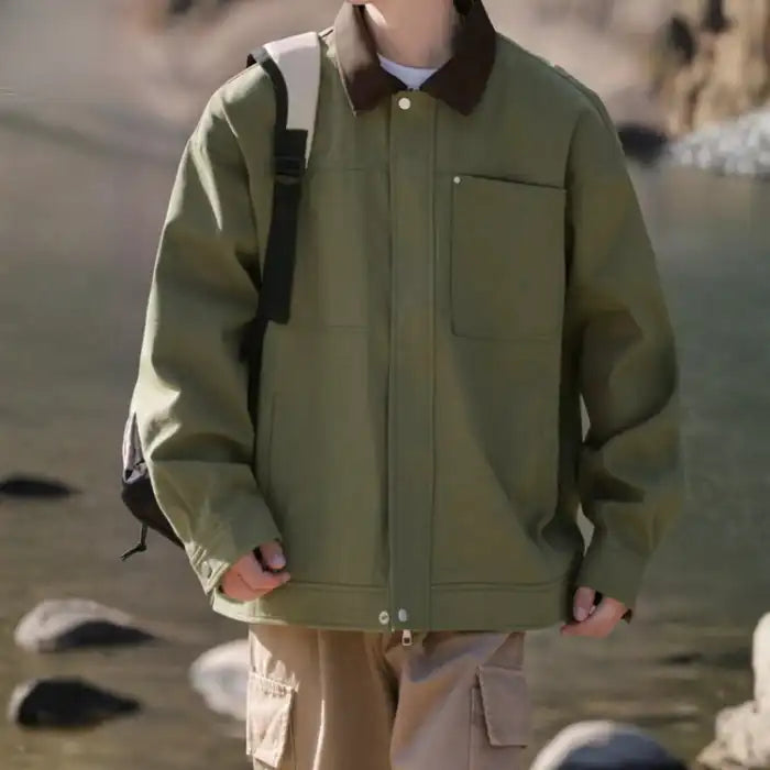 Mens contrast collar canvas jacket in olive green, worn casually outdoors, relaxed fit lifestyle shot