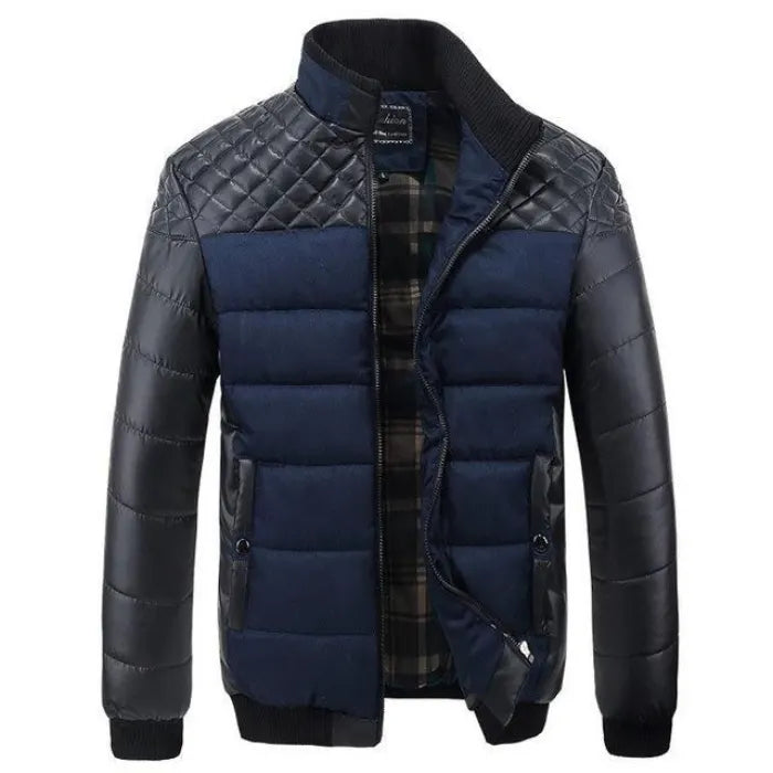 Mens insulated jacket in navy blue and black with diamond-quilted shoulders and padded sleeves.