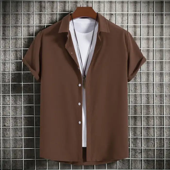 Men's plus size casual short sleeve button-up shirt in brown with white undershirt and necklace on hanger.