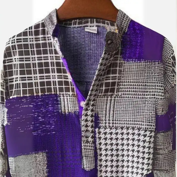 Close-up of men's plus size color block short sleeve shirt showing button detail and patchwork fabric design