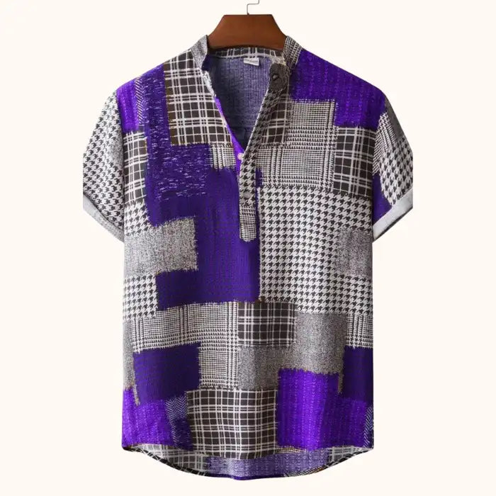  Men's plus size color block short sleeve shirt with purple, black, and gray patchwork pattern on hanger
