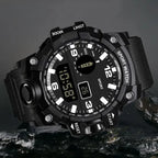 mens rugged digital sports watch waterproof shock resistant black model shown on rocks highlighting durable tough outdoor design