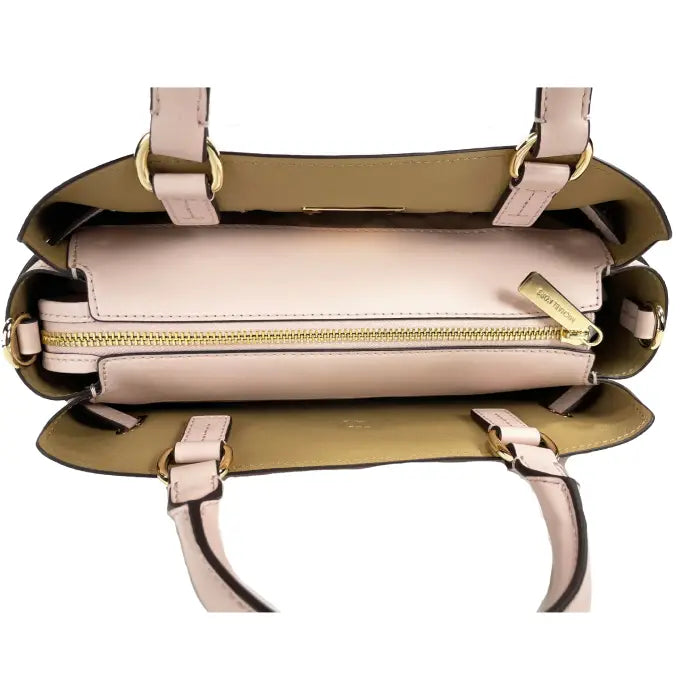 Top view of Michael Kors handbag with gold zipper and spacious interior, showcasing luxury and style.