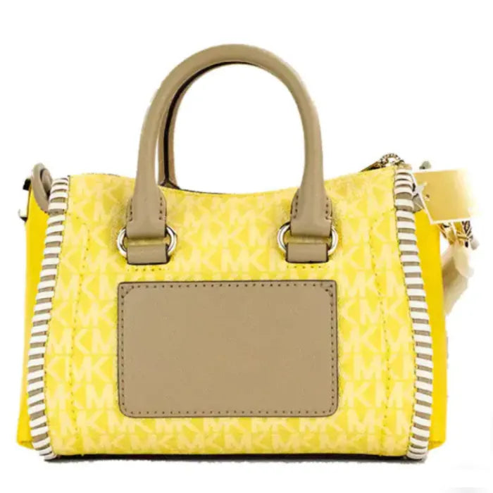 Back view of Michael Kors yellow logo tote with beige leather panel and striped sides.