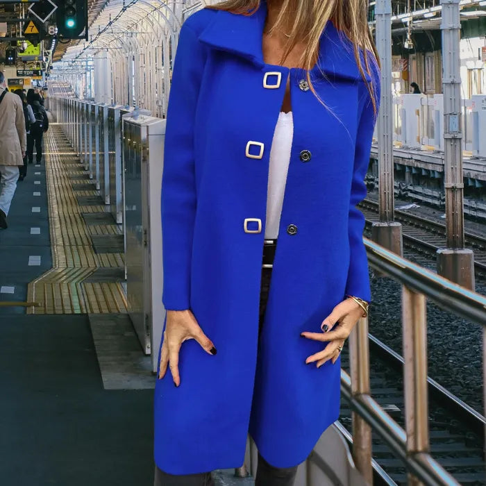 Mid length wool coat in royal blue styled with a tailored shape and premium details for a sophisticated urban appearance.