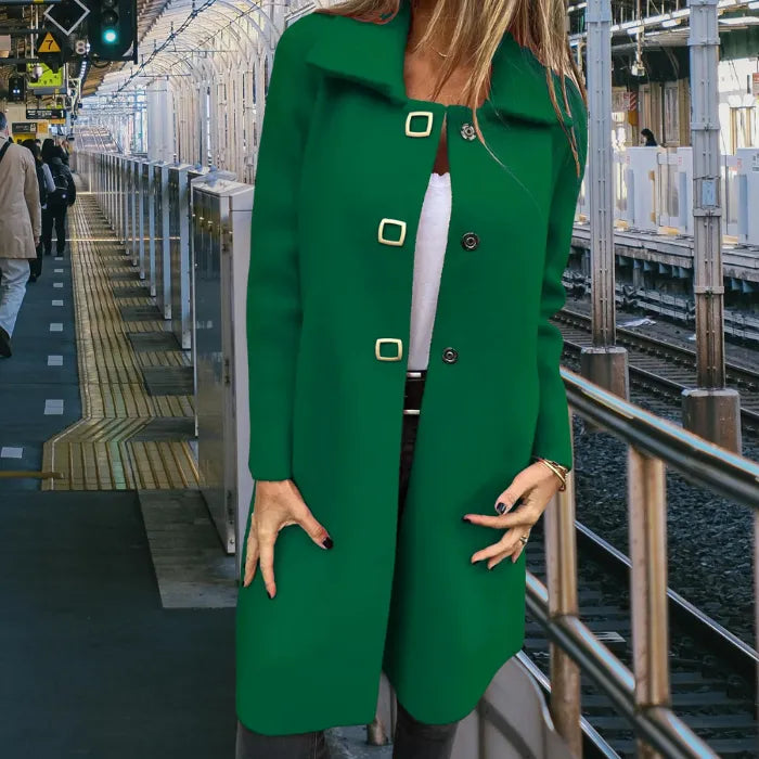 Mid length wool coat in rich green featuring a smooth wool finish and elegant buttons for confident daily wear.
