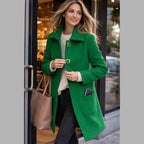 Mid length wool coat in bold green worn while shopping, offering a flattering fit and stylish warmth for daily use.