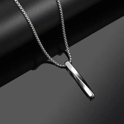 Minimalist silver bar pendant necklace on a chain, a versatile and stylish accessory for men or women.