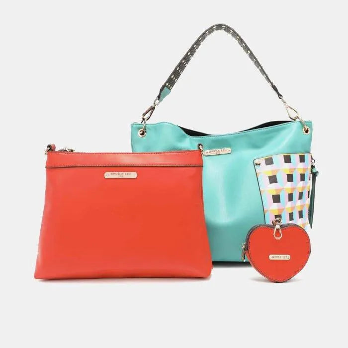 Mint green tote bag with coral clutch featuring geometric pattern panels and coordinating heart accessory pouch