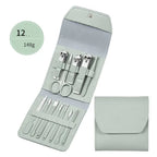  Mint green foldable manicure set with nail clippers, scissors and grooming tools in leather-like case