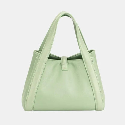 Back view of mint green David Jones handbag, showcasing sleek and minimalist design.