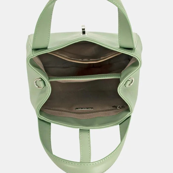 Interior of mint green David Jones handbag, featuring spacious compartments for organization.