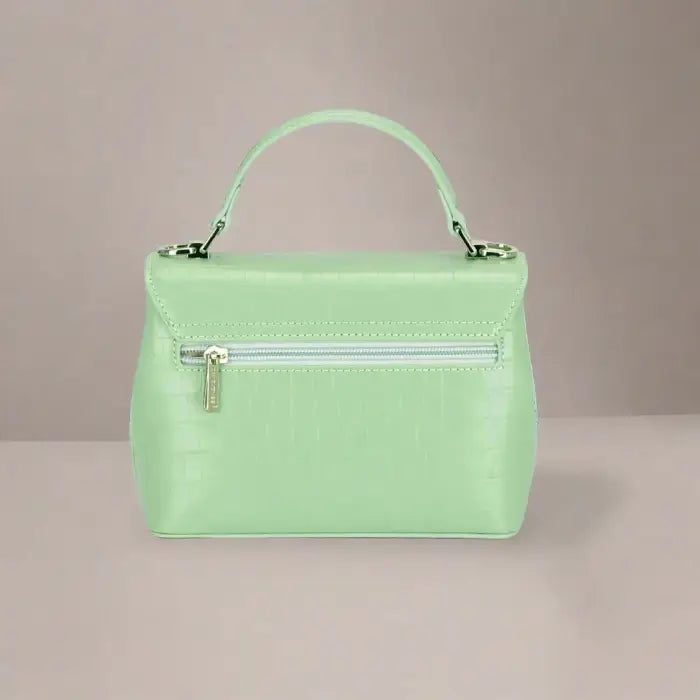 Mint green leather handbag with crocodile texture and zipper detail on the back for women's fashion.