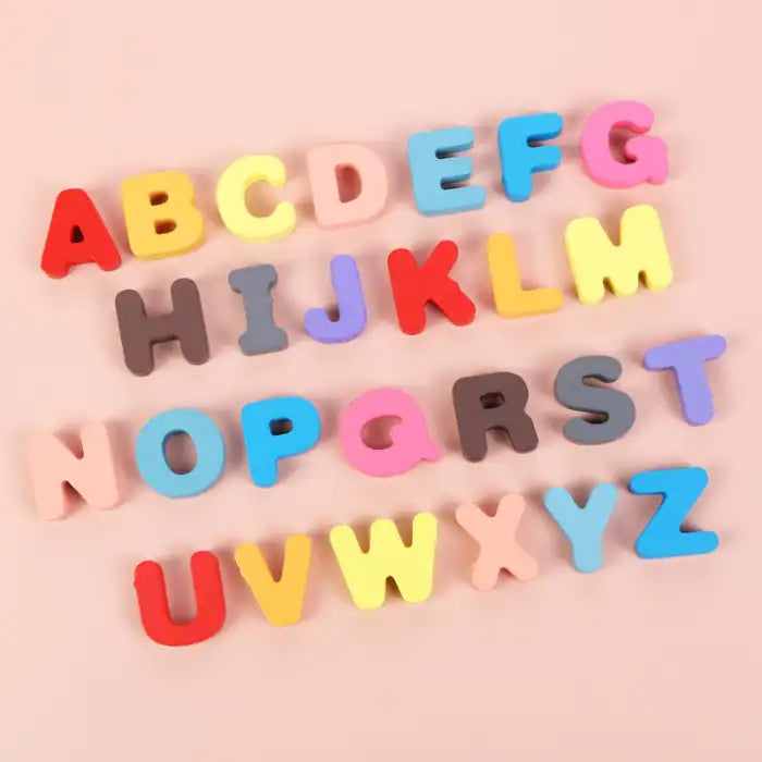 Montessori Math Board with colorful uppercase alphabet letters on a pink background.