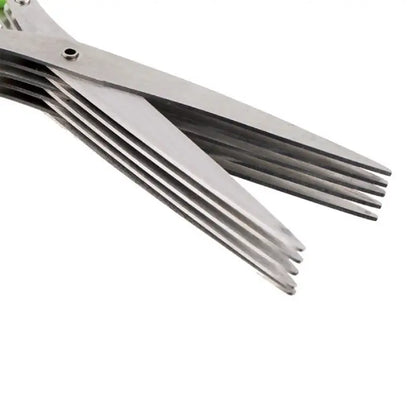 Close-up of stainless steel multi-blade scissors showcasing detailed blade structure on white background.