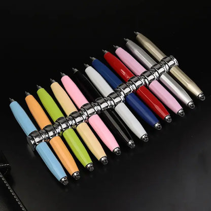 Collection of assorted fidget spinner pens in multiple colors, arranged in rows.