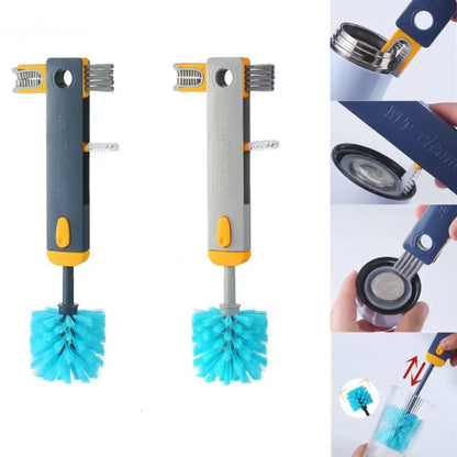 Two cleaning brushes with extendable handles in navy and gray, featuring turquoise bristles and yellow accents