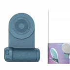 Multifunctional phone grip/stand with magnetic camera handle in blue with circular pattern.