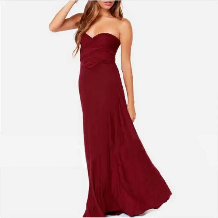 Multiway dress in burgundy with strapless sweetheart neckline and gathered wrap detail.